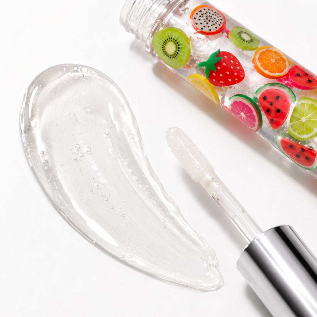 Clear high-shine Fruity Drip lip gloss texture with wand applicator