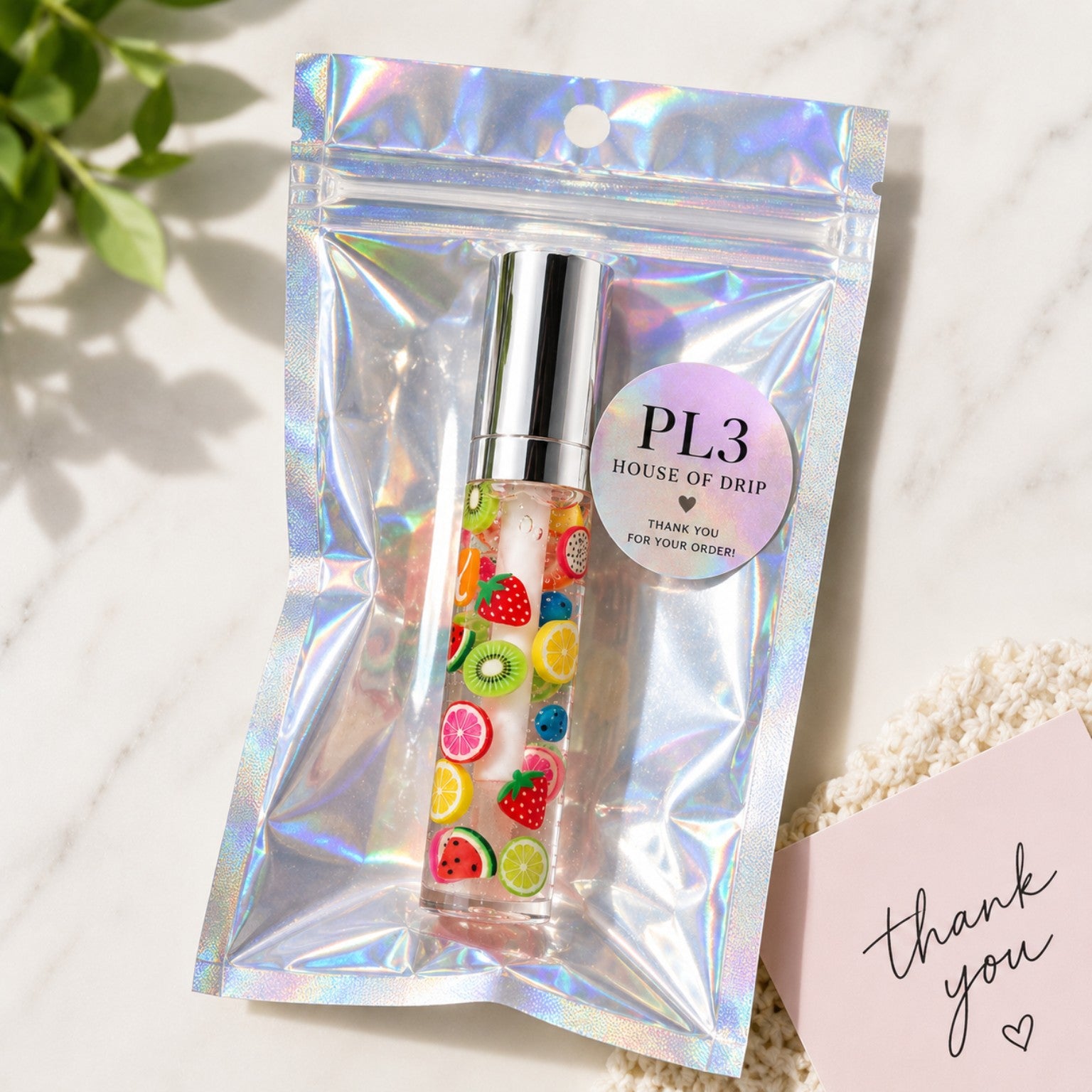 PL3 House of Drip Fruity Drip lip gloss in holographic gift-ready packaging