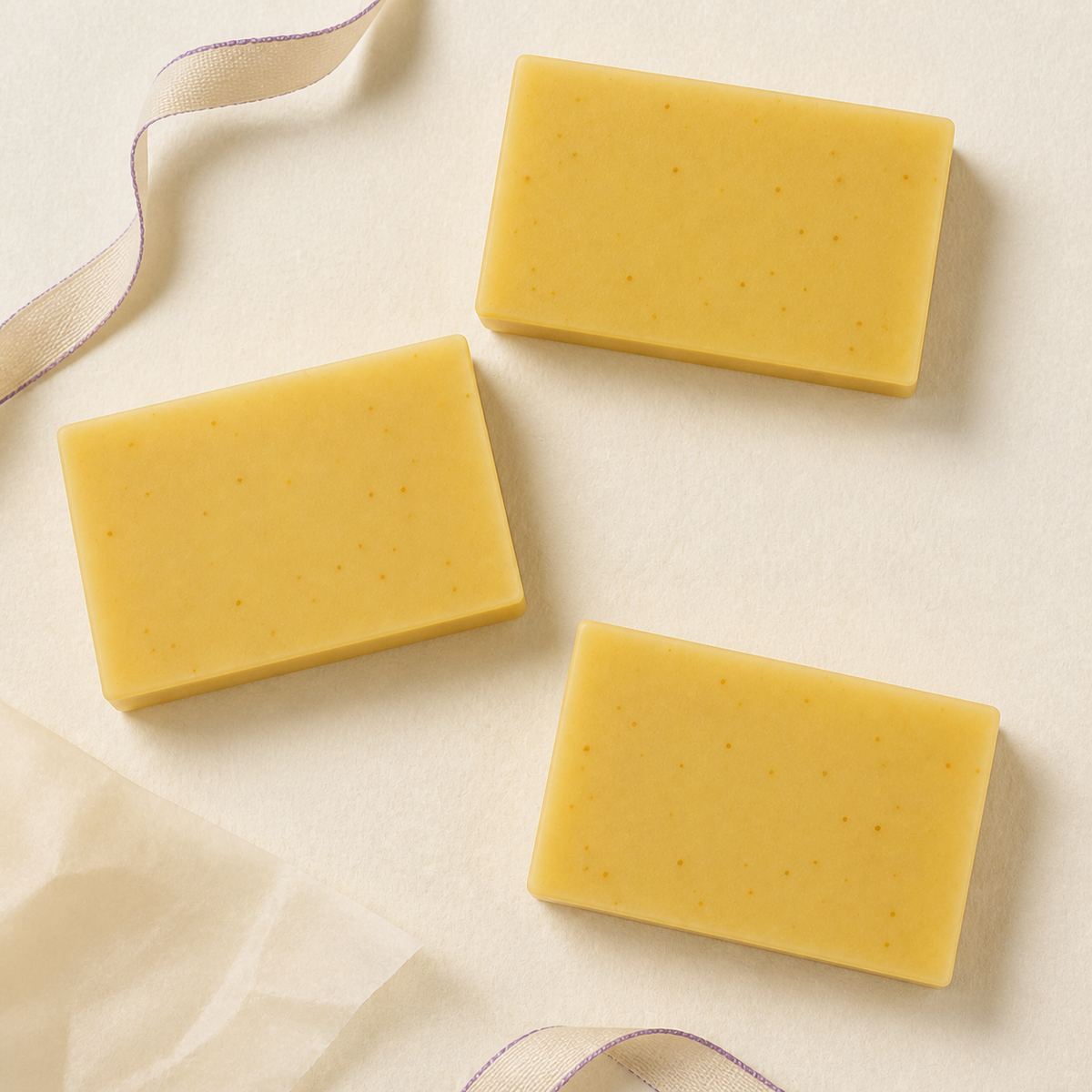 Three PL3 Ylang Ylang Lavender soap bars arranged as a premium gift set